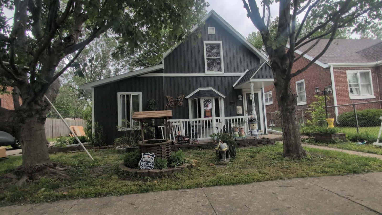 After — stunning dark charcoal board and batten siding